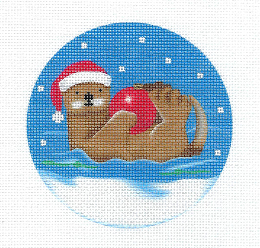 Sea Otter in a Santa Hat holding a Christmas Ornament 18 Mesh handpainted 4" Rd. Needlepoint Canvas by Pepperberry Designs