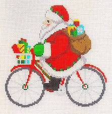 Christmas~Santa & Gifts Riding a Bicycle handpainted Needlepoint Canvas~by Susan Roberts ** SPECIAL ORDER**